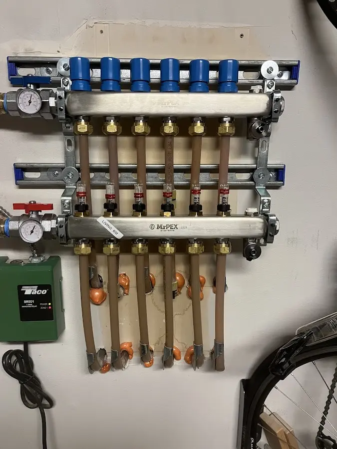 Plumber performing Gas Line Installation at a residential property in Falls City